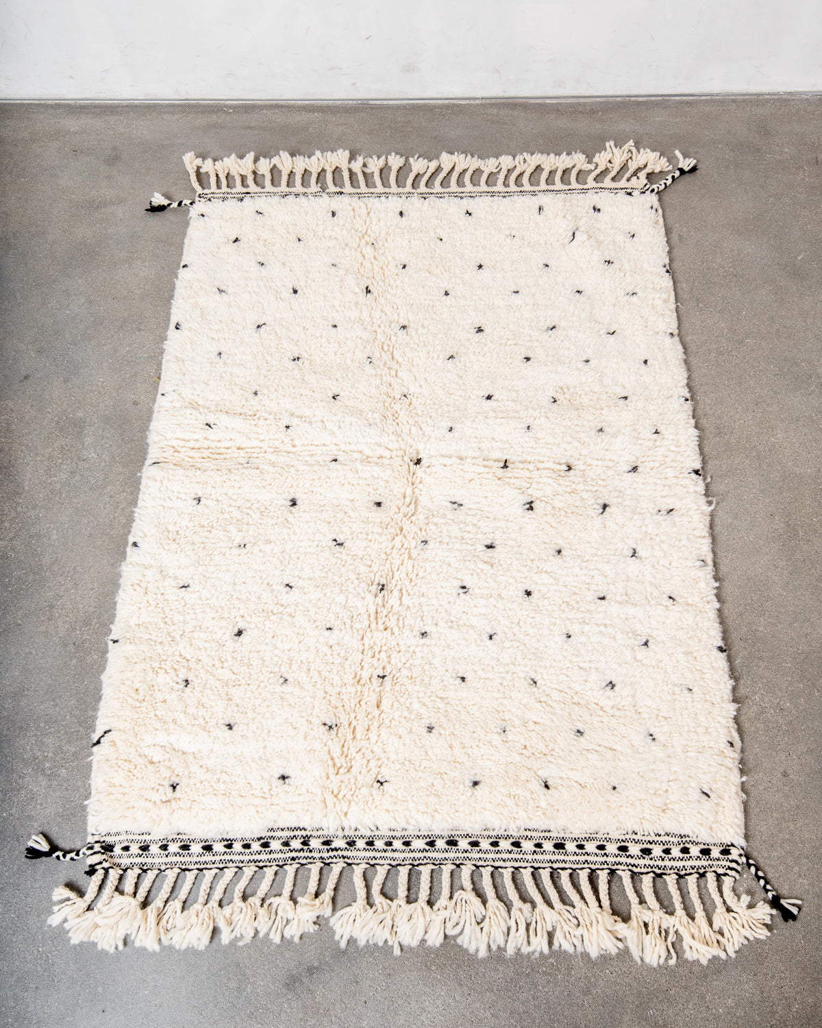 Modern, designer, handcrafted Berber rug from Morocco. Beniourain carpet with beautiful colours and patterns and fluffy wool texture.